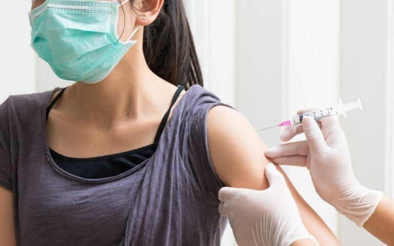 Women getting vaccinated