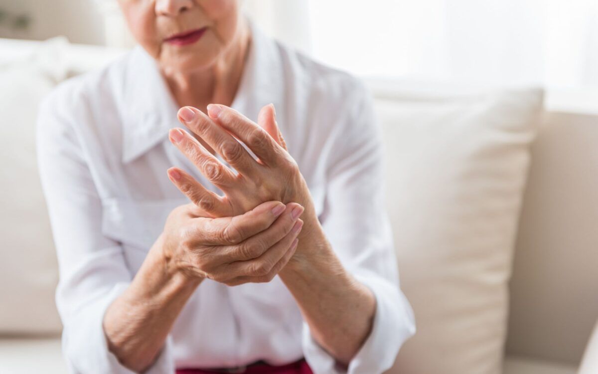 Elderly Woman Holding Hand Arthritis